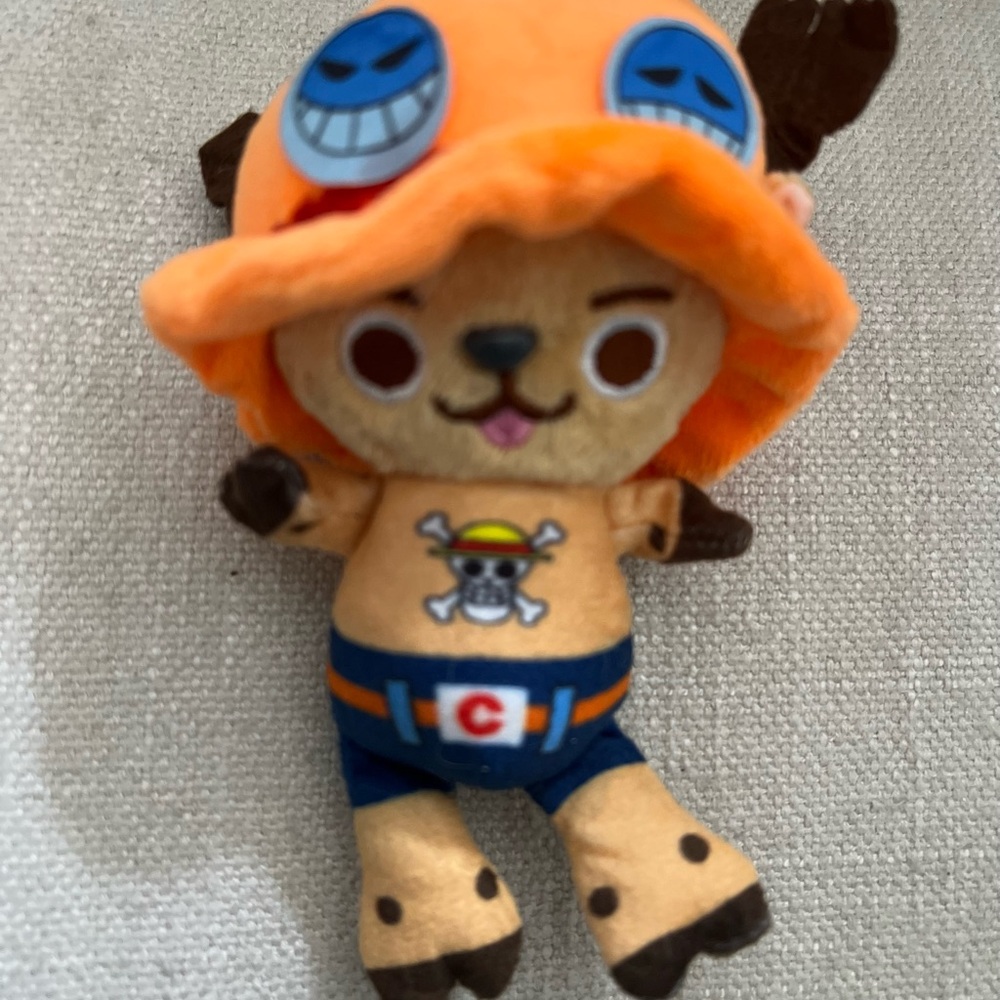 Playful Pirate Plush with Orange Hat